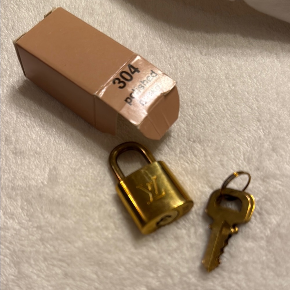 Gold Louis Vuitton Padlock with Key